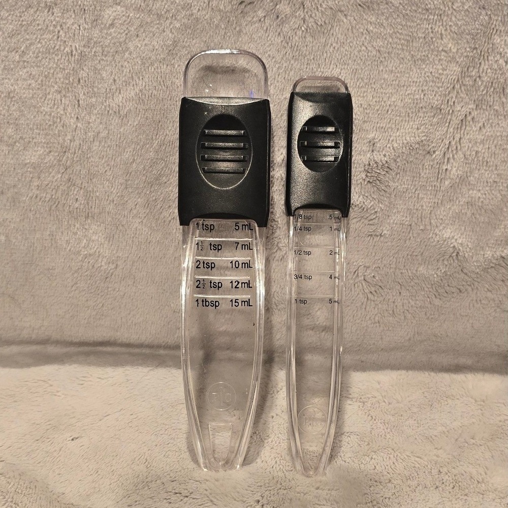 Pampered Chef Adjustable Measuring Spoon Set Clear Black 2 Piece 1/8 tsp-1 tbsp